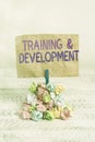 Text sign showing Training And Development. Conceptual photo Organize Additional Learning expedite Skills Reminder pile colored