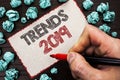 Text sign showing Trends 2019. Conceptual photo Current Movement Latest Branding New Concept Prediction written by Man Holding Mar