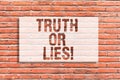 Text sign showing Truth Or Lies. Conceptual photo Decide between a fact or telling a lie Doubt confusion Brick Wall art