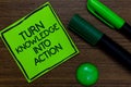 Text sign showing Turn Knowledge Into Action. Conceptual photo Apply what you have learned Leadership strategies Written on sticky Royalty Free Stock Photo