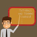 Text sign showing Tutorials And Training Courses. Conceptual photo Learning Coaching Education School attendance Man Royalty Free Stock Photo