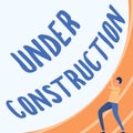 Text sign showing Under Construction. Business idea building that is unfinished but actively being worked on Gentleman Royalty Free Stock Photo