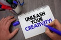 Text sign showing Unleash Your Creativity Call. Conceptual photo Develop Personal Intelligence Wittiness Wisdom Man hold holding b Royalty Free Stock Photo