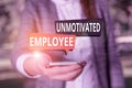 Text sign showing Unmotivated Employee. Conceptual photo very low self esteem and no interest to work hard Woman in grey