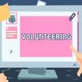 Text sign showing Volunteering. Internet Concept Provide services for no financial gain Willingly Oblige Hand Touching