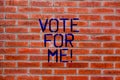 Text sign showing Vote For Me. Conceptual photo Campaigning for a government position in the upcoming election Brick Royalty Free Stock Photo
