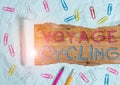 Text sign showing Voyage Cycling. Conceptual photo Use of bicycles for transport recreation and exercise Stationary and torn Royalty Free Stock Photo