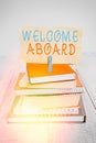 Text sign showing Welcome Aboard. Conceptual photo Expression of greetings to an individual whose arrived is desired pile stacked Royalty Free Stock Photo