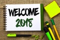 Text sign showing Welcome 2018. Conceptual photo Celebration New Celebrate Future Wishes Gratifying Wish written on Notebook Book