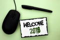 Text sign showing Welcome 2018. Conceptual photo Celebration New Celebrate Future Wishes Gratifying Wish written on Sticky Note Pa