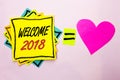 Text sign showing Welcome 2018. Conceptual photo Celebration New Celebrate Future Wishes Gratifying Wish written on Yellow Sticky