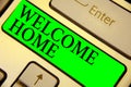 Text sign showing Welcome Home. Conceptual photo Expression Greetings New Owners Domicile Doormat Entry Keyboard green key Intenti Royalty Free Stock Photo