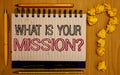 Text sign showing What Is You Mission Question. Conceptual photo asking someone about his plans and to-do list Notepad with outlin