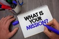 Text sign showing What Is Your Mission Question. Conceptual photo Positive goal focusing on achieving success Man hold holding blu