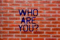 Text sign showing Who Are You. Conceptual photo Introduce Identify yourself demonstratingality likes dislikes Brick Wall