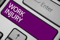 Text sign showing Work Injury. Conceptual photo Accident in job Danger Unsecure conditions Hurt Trauma Keyboard purple key Intenti Royalty Free Stock Photo