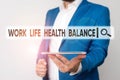 Text sign showing Work Life Health Balance. Conceptual photo Stability and Harmony to prevent burnt out Man in the blue Royalty Free Stock Photo