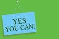 Text sign showing Yes You Can. Conceptual photo Positivity Encouragement Persuade Dare Confidence Uphold Blue board wall