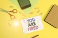 Text sign showing You Are Fired. Conceptual photo Getting out from the job and become jobless not end the career Paper