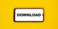 Text on the smartphone screen DOWNLOAD. Technology on an orange background Royalty Free Stock Photo