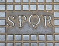 Latin Text SPQR in Rome  Senatus Populusque Romanusthat means Royalty Free Stock Photo