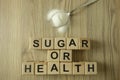 Text sugar or health from wooden blocks