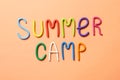 Text SUMMER CAMP made of modelling clay on color background Royalty Free Stock Photo