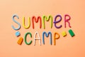 Text SUMMER CAMP made of modelling clay on color background Royalty Free Stock Photo
