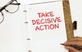 Text TAKE DECISIVE ACTION Calculator, pen and charts, documents and graphs