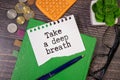 text Take a deep breath on white paper Royalty Free Stock Photo