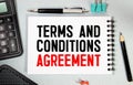 text TERMS AND CONDITIONS on the white short note paper Royalty Free Stock Photo