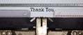 Text `thank you` typed on retro typewriter. Business concept. Beautiful background