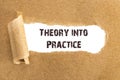 The text Theory into Practice appearing behind torn brown paper