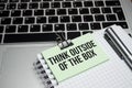 The text Think Outside of the Box on the notepad Royalty Free Stock Photo