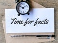 Text time for facts written on white paper