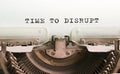 The text TIME TO DISRUPT is typed on paper by an antique typewriter. Vintage inscription, retro style, grunge, concept Royalty Free Stock Photo