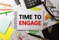 text TIME TO ENGAGE on the white short note paper yellow background Royalty Free Stock Photo