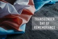 Text transgender day of remembrance, and flag
