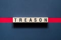 Text Treason concept on cubes