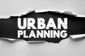 Text Urban Planning on torn paper, representing city development, architecture, and community infrastructure concepts for design, Royalty Free Stock Photo