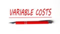 Text VARIABLE COST with ped pen on the white background