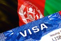 text VISA on Afghanistan visa stamp in passport. passport traveling abroad concept. Travel to Afghanistan concept - selective