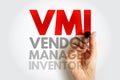 Text VMI Vendor Managed Inventory with a hand writing. Concept of supply chain, stock management, and vendor control system Royalty Free Stock Photo