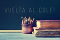 The text vuelta al cole, back to school in spanish, written in a