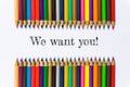 Text We want you! on color pencil background / business concept