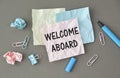 Text welcome aboard on the short note on Crumpled paper Royalty Free Stock Photo