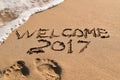 Text welcome 2017 in the sand of a beach Royalty Free Stock Photo