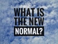 Text what is the new normal with blurry white clouds and blue sky as background