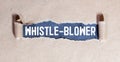 text Whistle-blower on torn paper, business concept Royalty Free Stock Photo