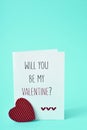 Text will you be my valentine in a postcard Royalty Free Stock Photo